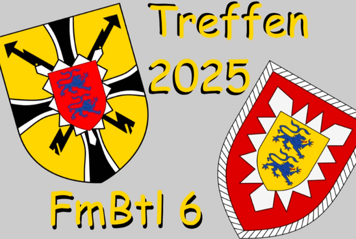Zwei bunte Wappen und der Text "Treffen 2025 FmBtl 6" sind auf einem grauen Hintergrund abgebildet.